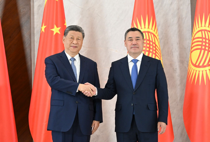 “我将无我、不负人民”的世界回响